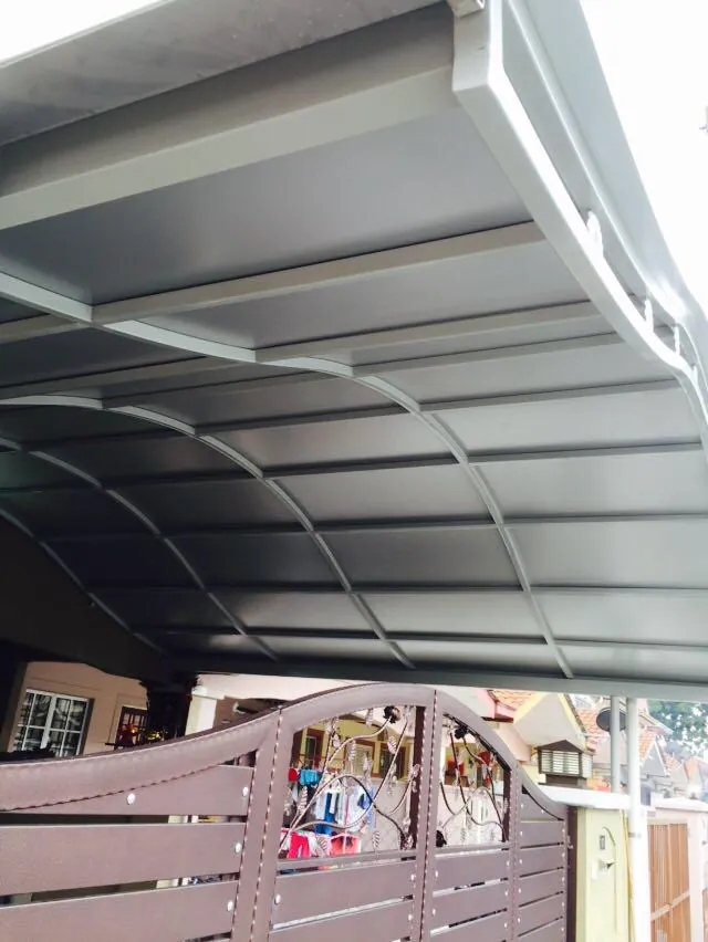 Grey ACP awning over a house entrance