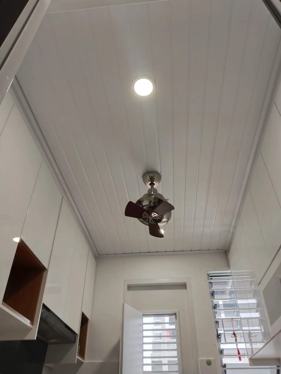 White PVC ceiling in a double height room