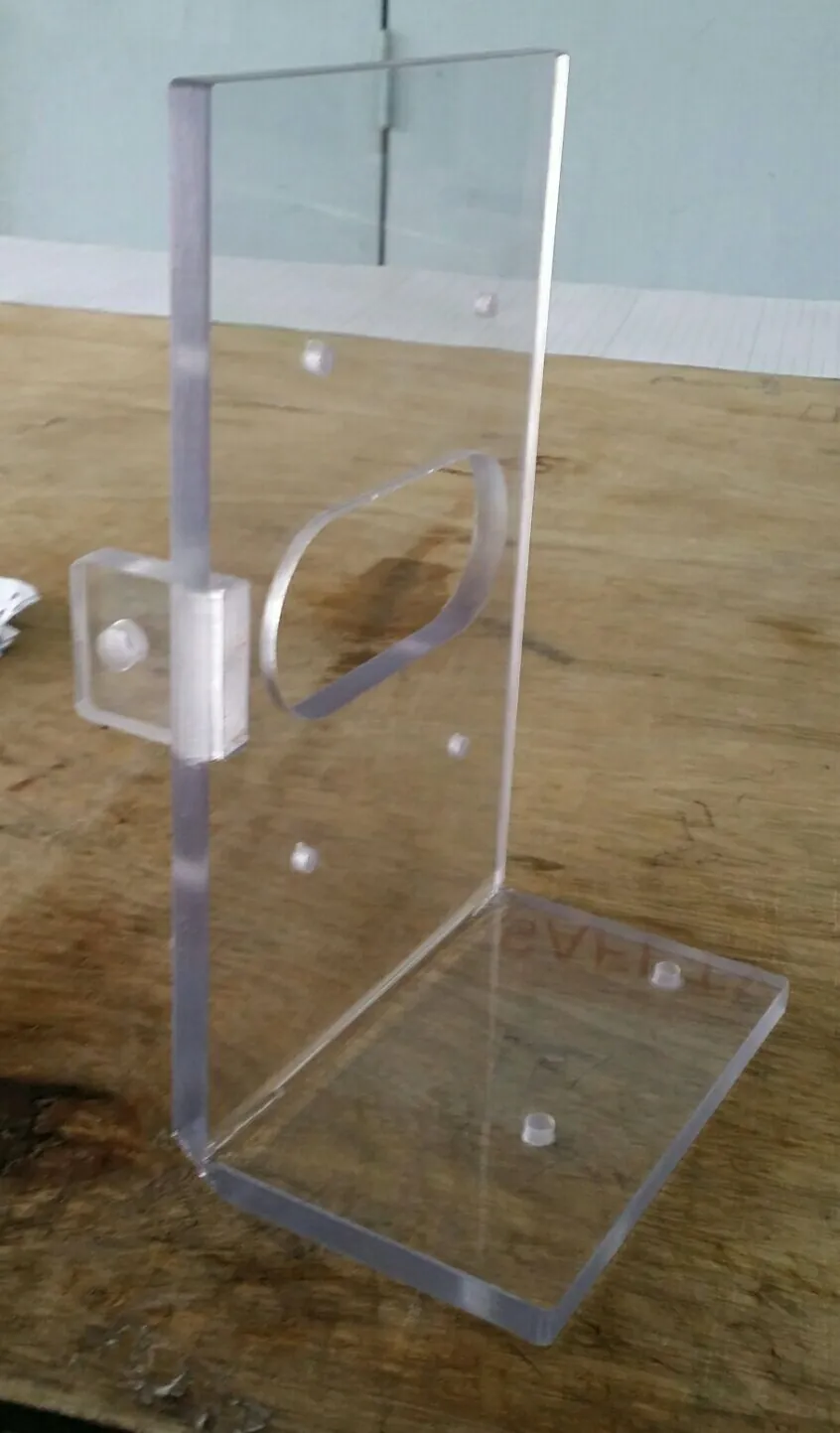Bent polycarbonate guard with cut outs